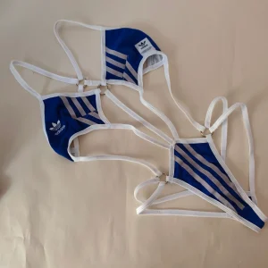 Body fake adidas blu + flamingo saver